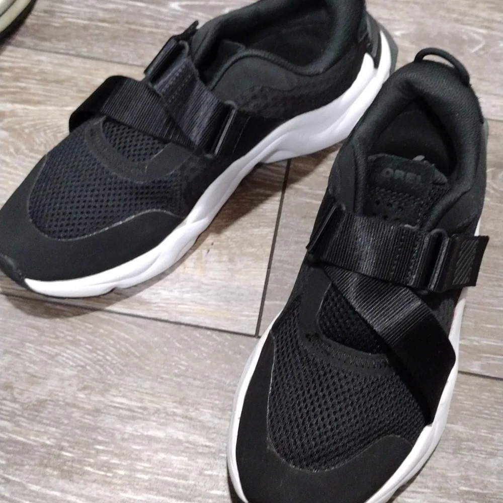 Sorel womens black leather and black mesh sneakers. Mint condition. Size 9
